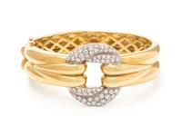 An 18 Karat Bicolor Gold and Diamond Bangle Bracelet,