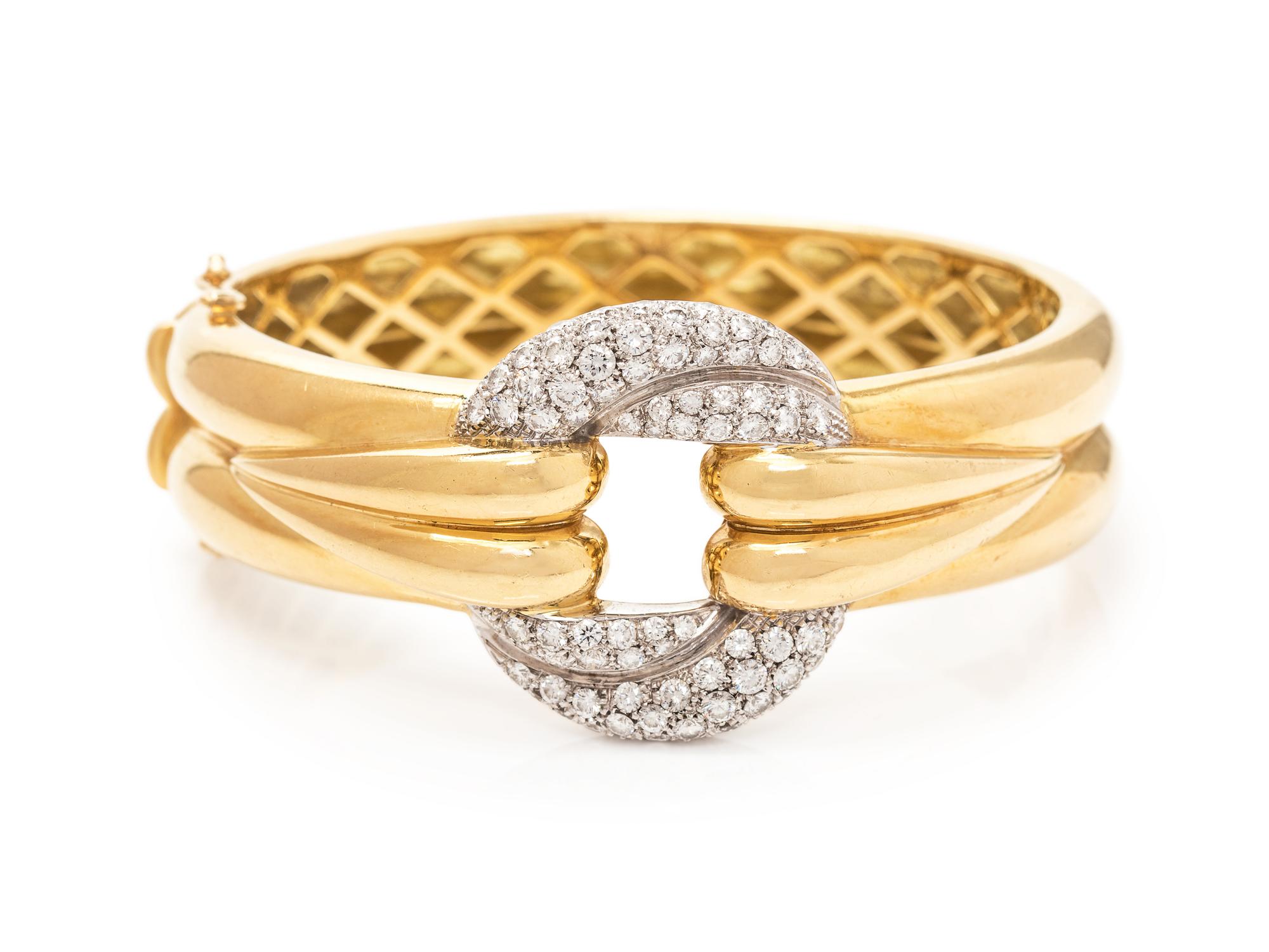 An 18 Karat Bicolor Gold and Diamond Bangle Bracelet,