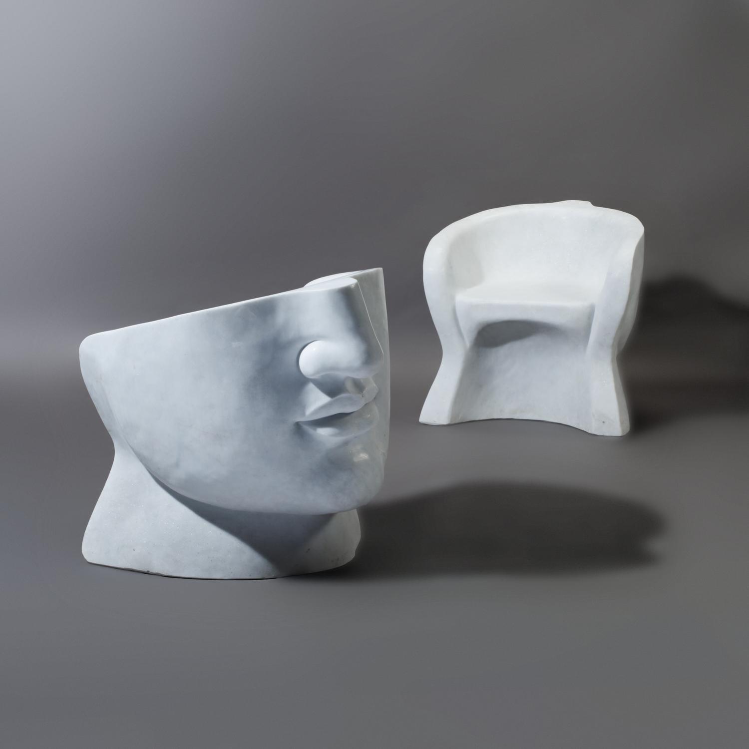 Pair of white marble 'Face' chairs
