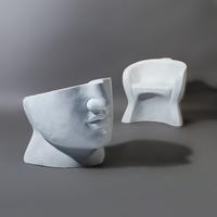 Pair of white marble 'Face' chairs