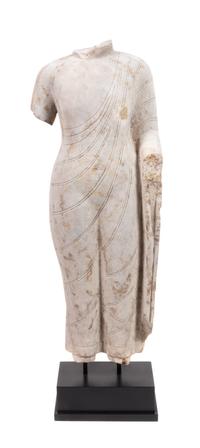 A Chinese Carved Limestone Torso of Buddha Height 28 inches. — NORTHERN QI DYNASTY (550-577)