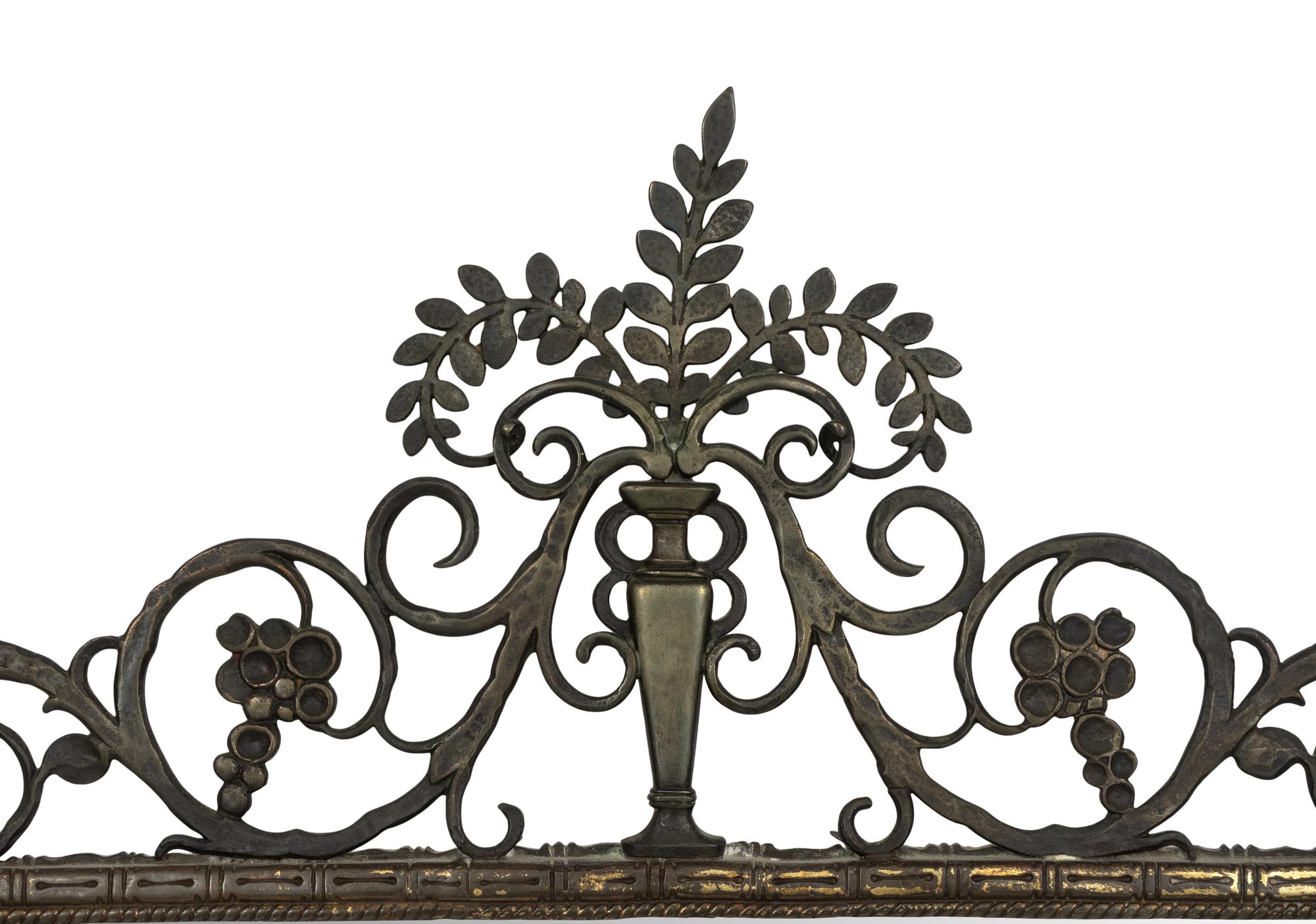 A Gilt Bronze Shield-Form Mirror