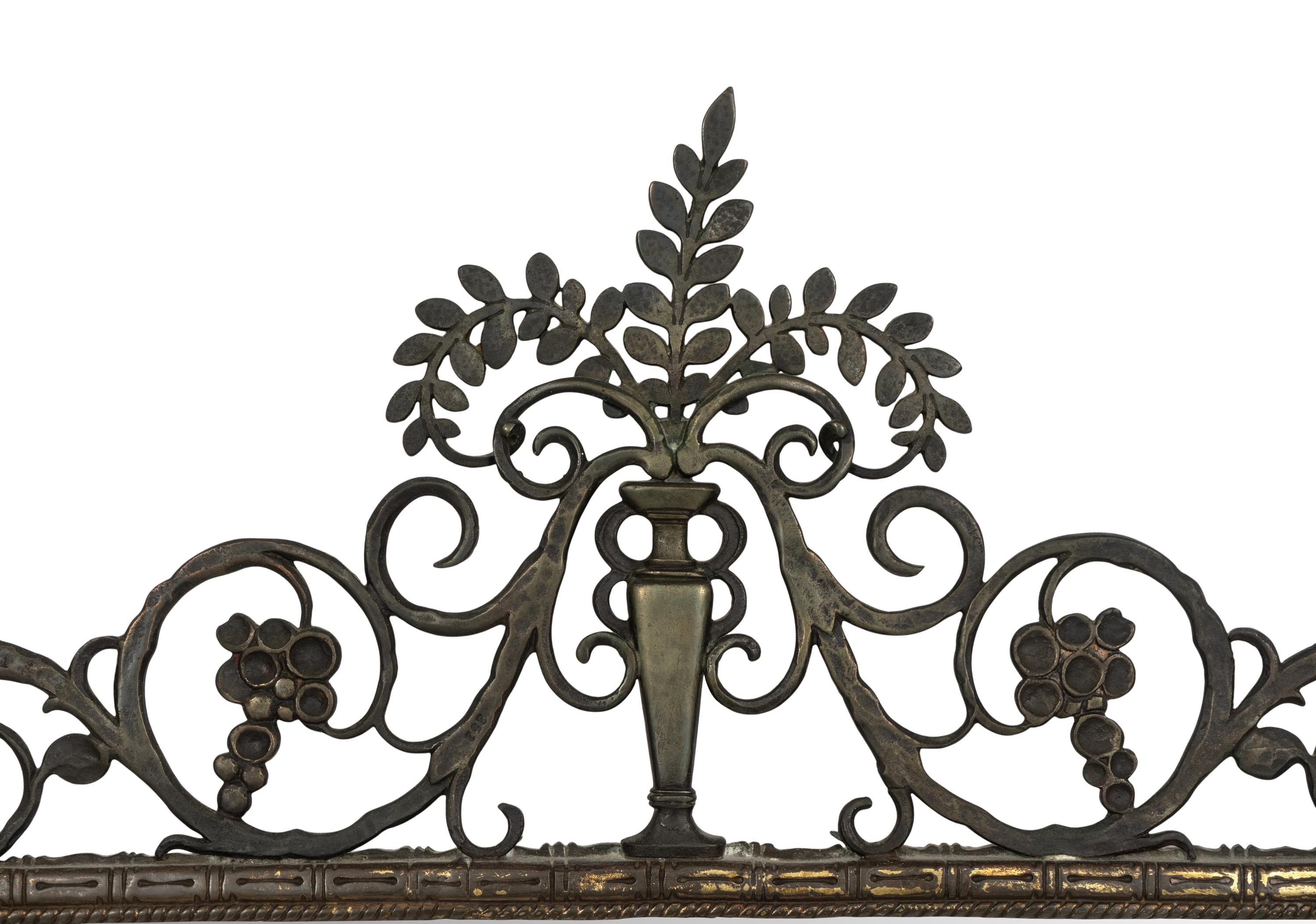 A Gilt Bronze Shield-Form Mirror