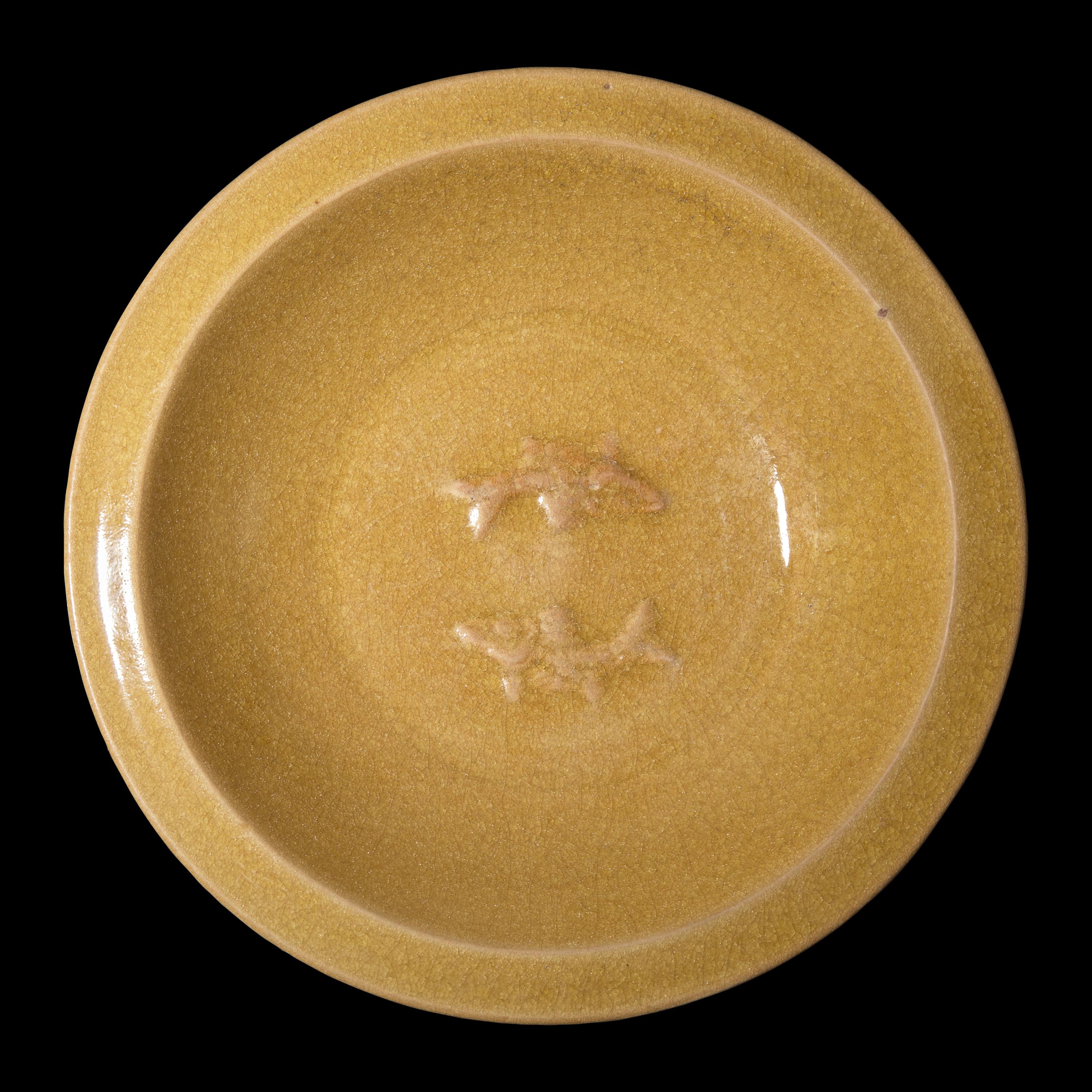 A 'Golden Longquan' or 'Beishoku' Double-Fish Dish, Southern Song to Yuan Dynasty 南宋-元 龍泉窯 米黃釉雙魚洗