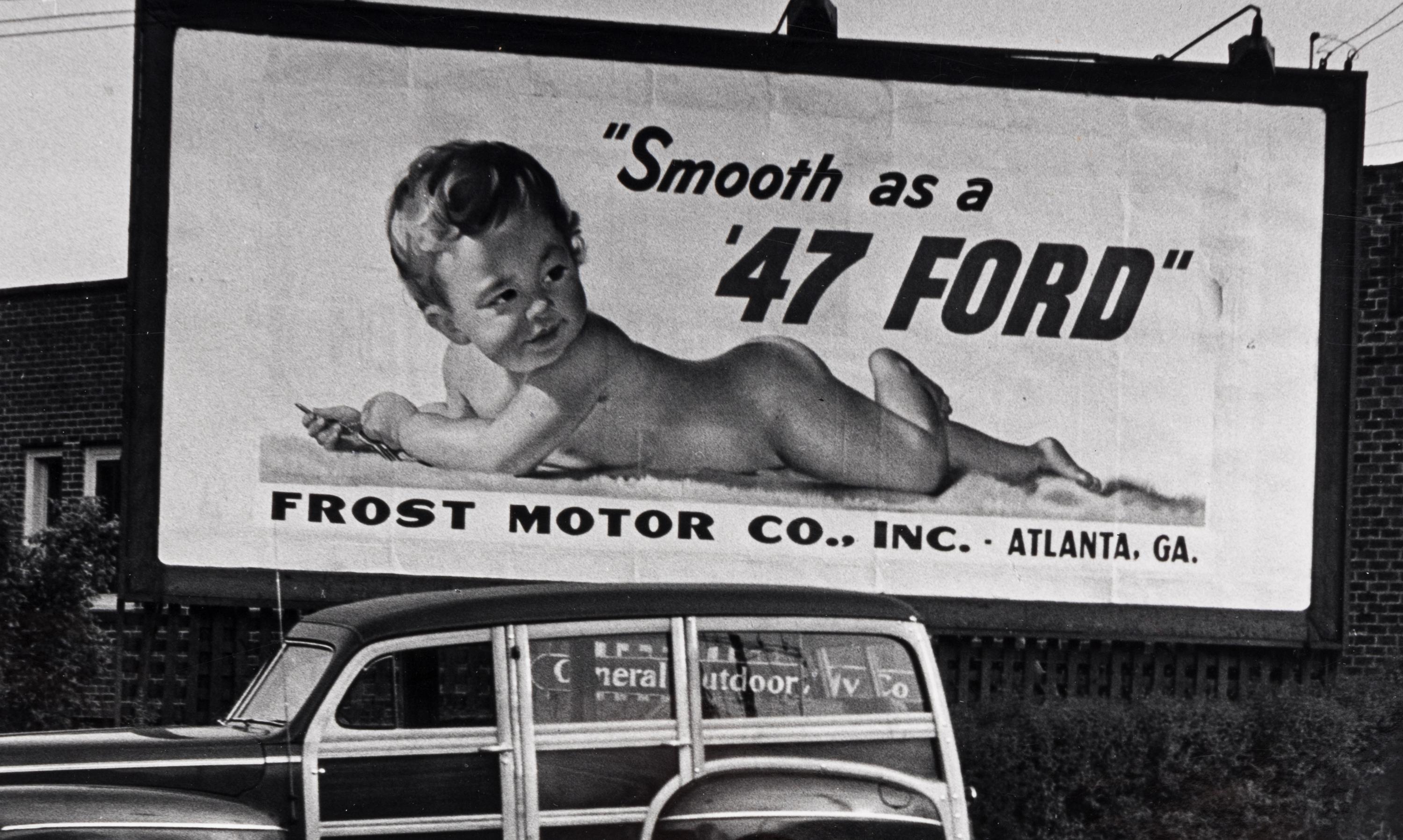 Philippe Halsman (1906-1997) Untitled ("Smooth as a 47 Ford" Billboard), c. 1947