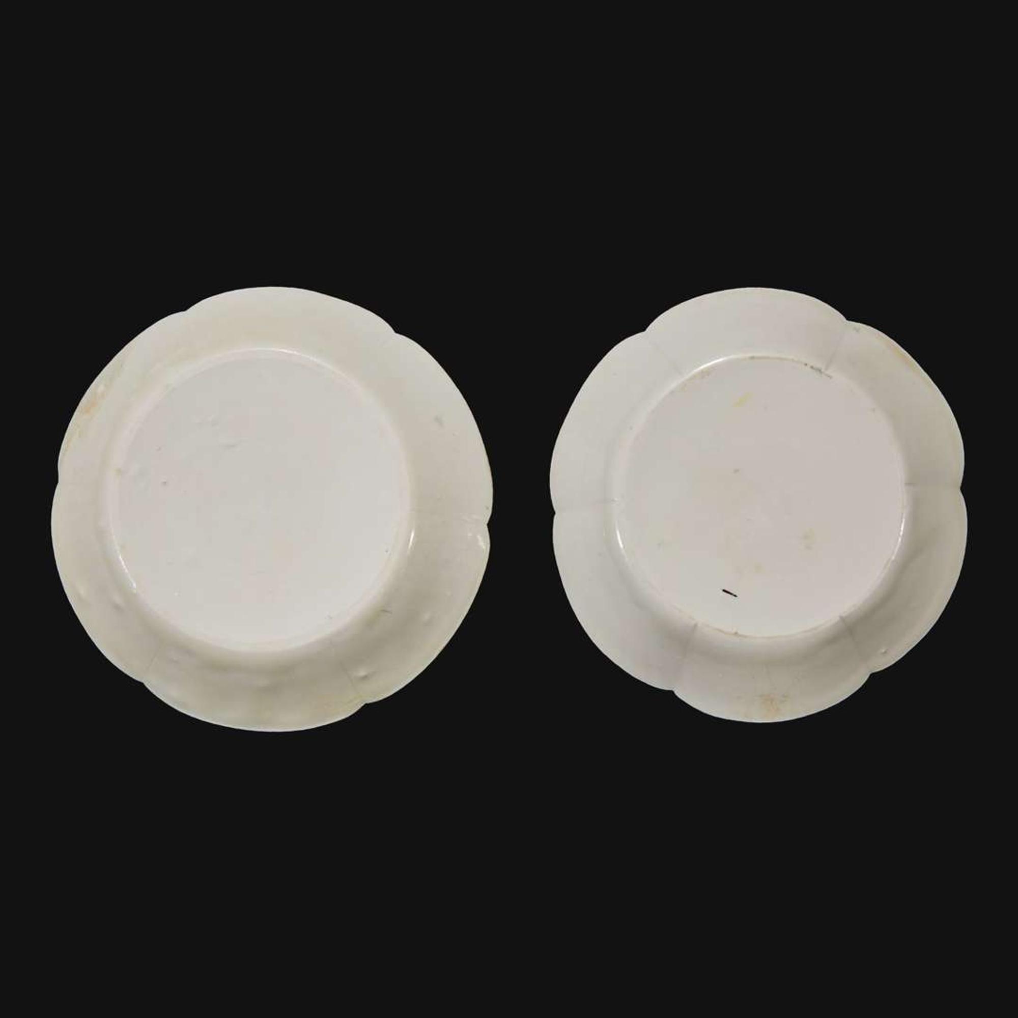 An associated pair of Chinese whiteware floriform dishes Song dynasty