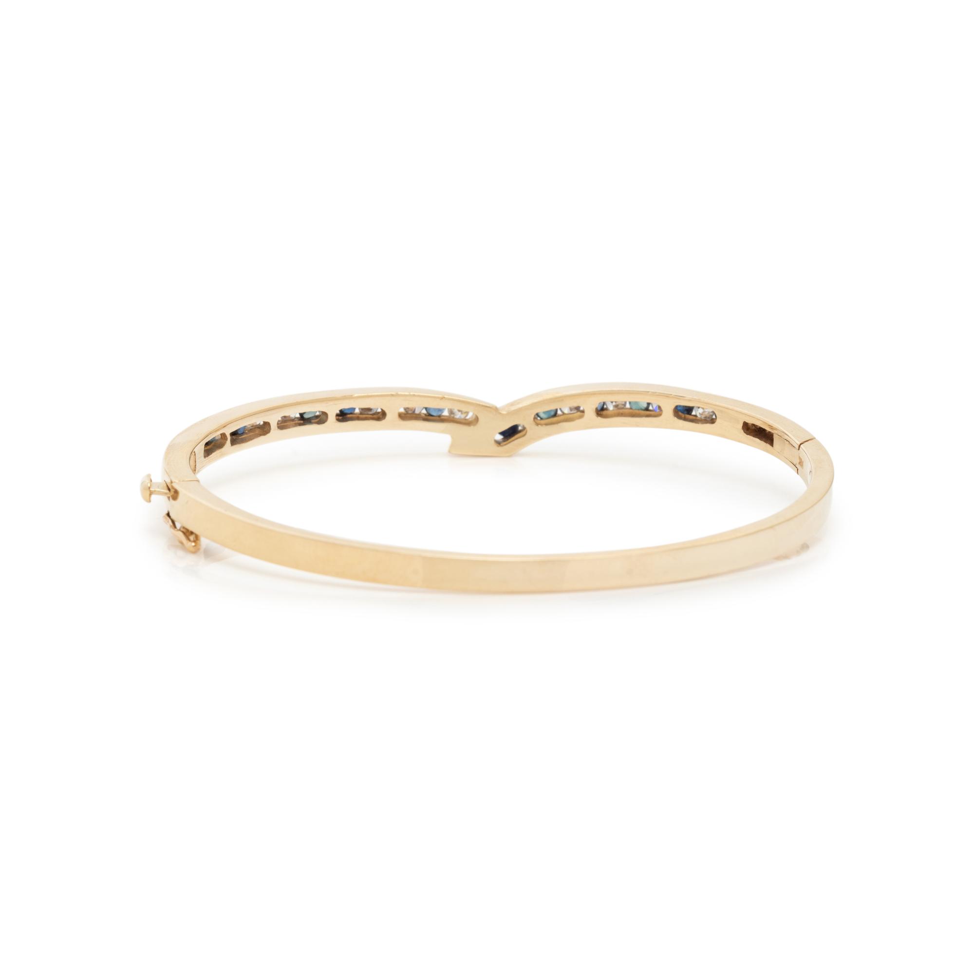 YELLOW GOLD, DIAMOND AND SAPPHIRE BANGLE BRACELET