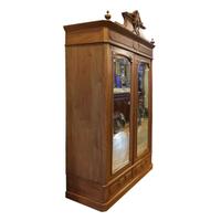 A Victorian Walnut Two Door Armoire 52" W x 22" D x 83" H — United States, Circa 1880