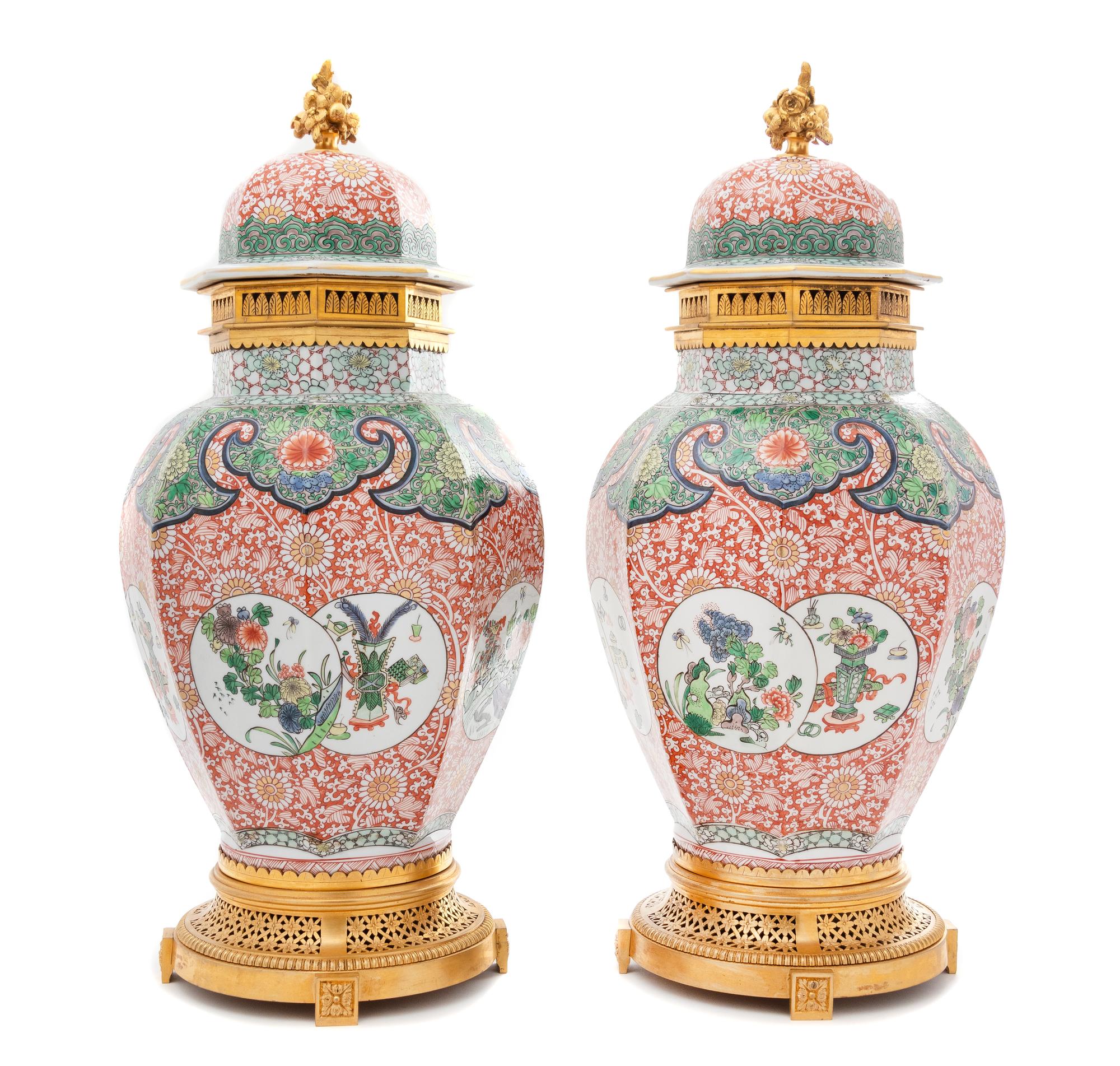 A Pair of French Gilt Bronze Mounted Porcelain Covered Vases Height overall 20 3/4 inches. — 20TH CENTURY