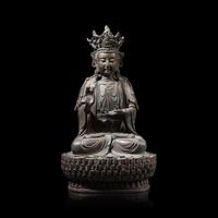 A Chinese Patinated Bronze Figure of a Seated Bodhisattva 銅觀音坐像