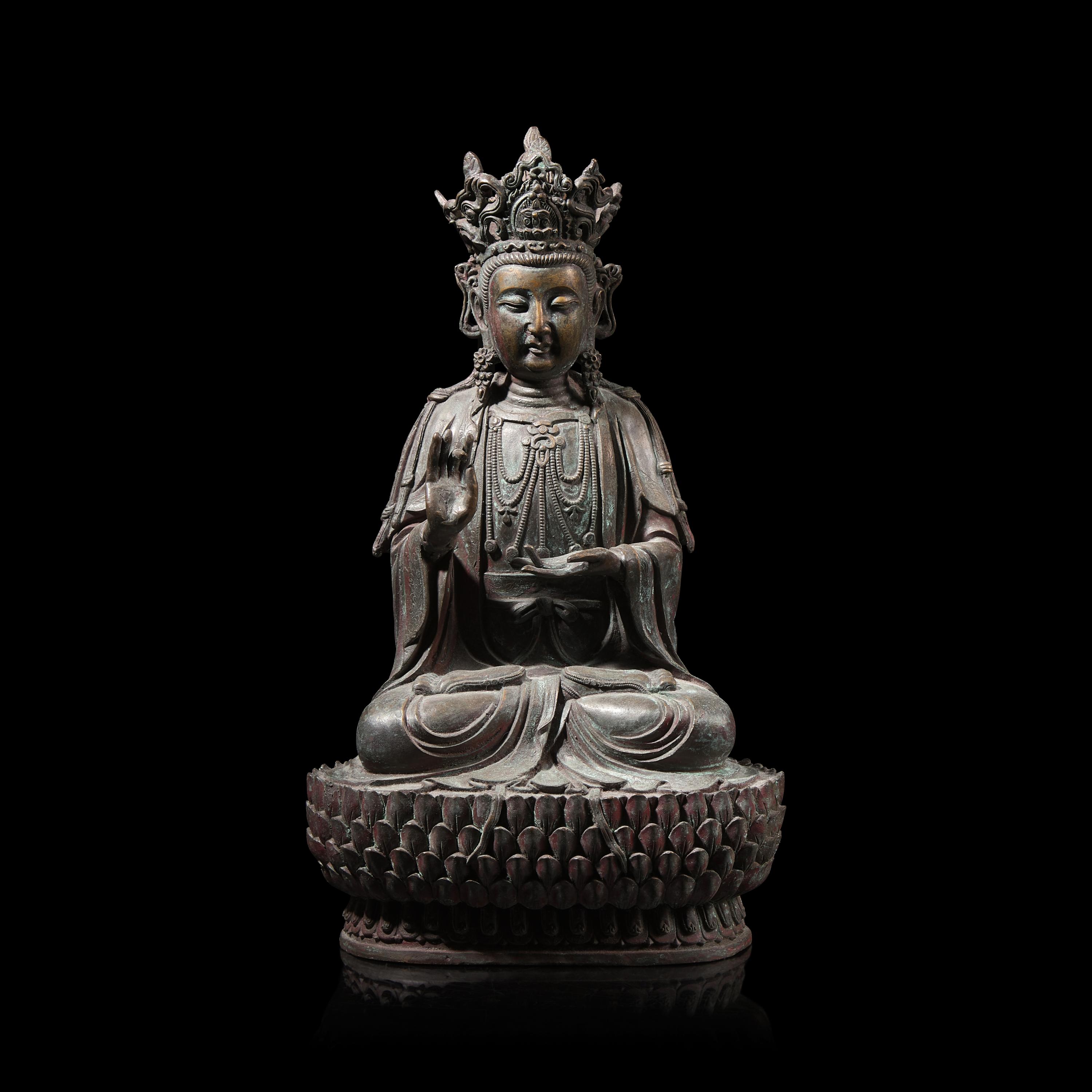 A Chinese Patinated Bronze Figure of a Seated Bodhisattva 銅觀音坐像
