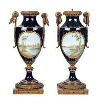 A Pair of Gilt Bronze Mounted Sèvres Style Porcelain Urns