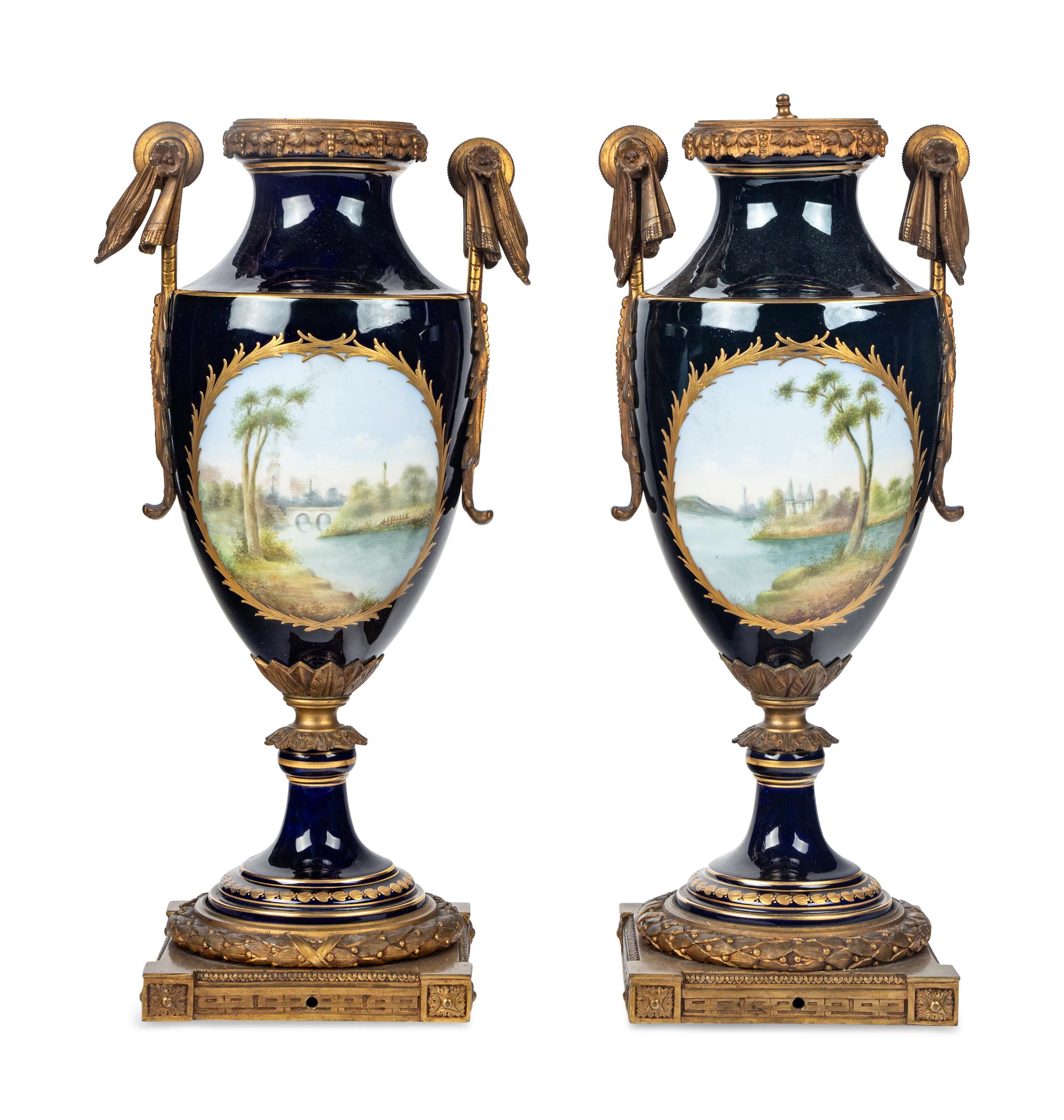 A Pair of Gilt Bronze Mounted Sèvres Style Porcelain Urns