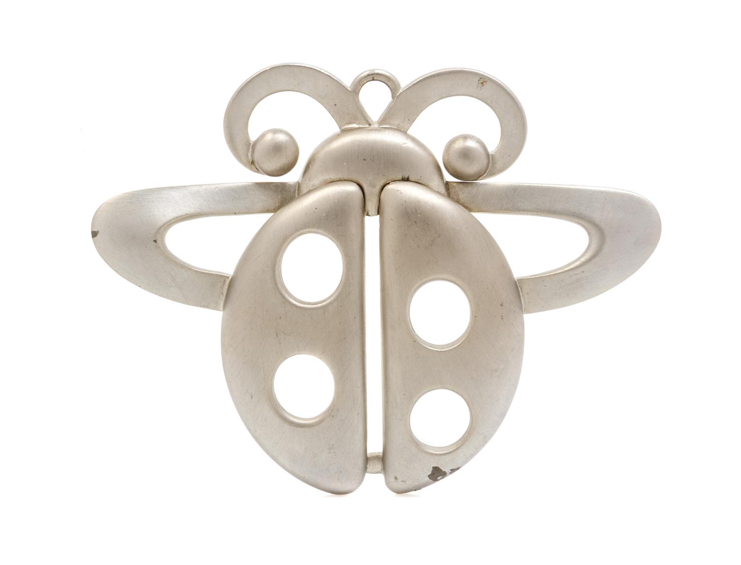 A Pierre Cardin Runway Silvertone Ladybug Pendant.