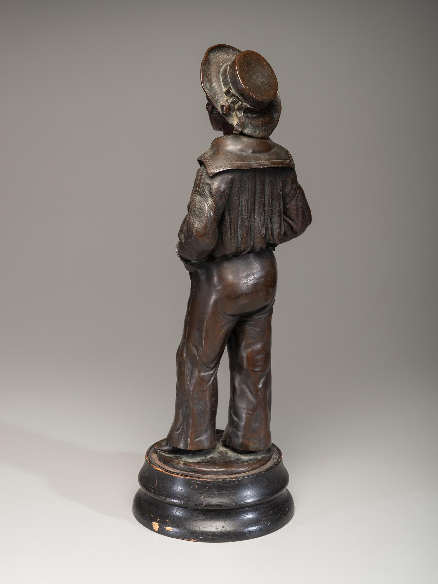 A Cast Bronze Figure of a Sailor Boy