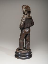 A Cast Bronze Figure of a Sailor Boy