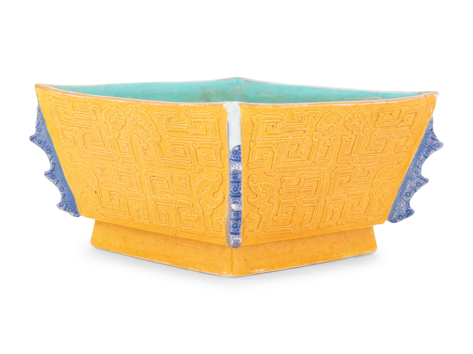 A Chinese Yellow Glazed Carved Porcelain Square Bowl