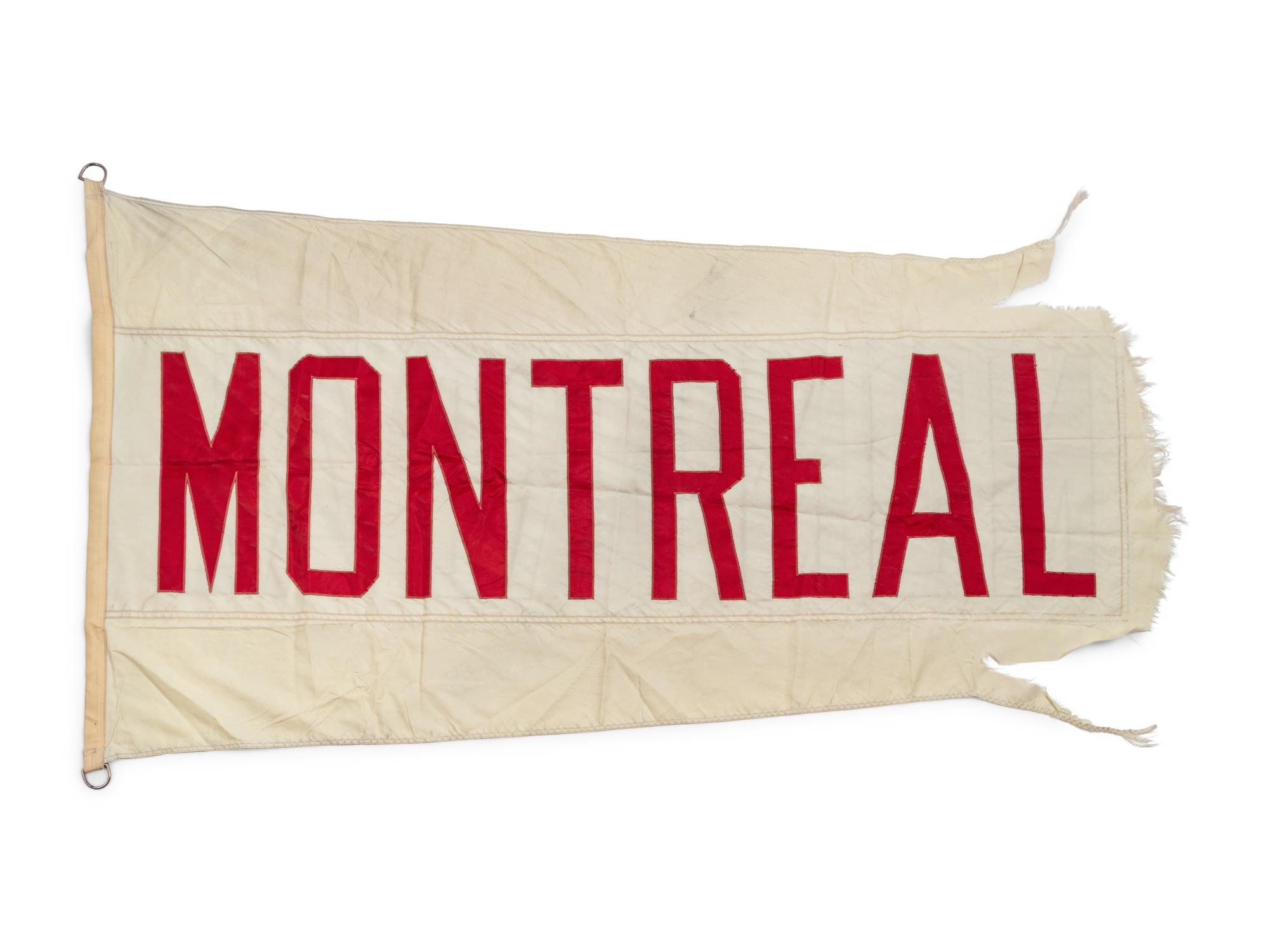 A Montreal Flag Once Flown on Wrigley Field Scoreboard Collected by Former Chicago Cubs Wrigley Field Head Scorekeeper,