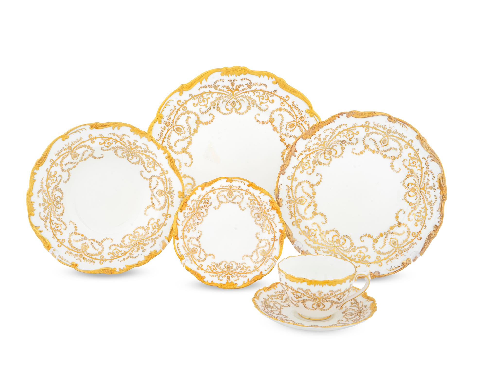 A Coalport Porcelain Dinner Service