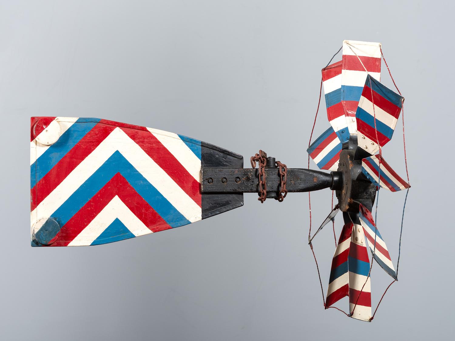 A Patriotic Red, White and Blue Painted Sheet Metal Whirligig