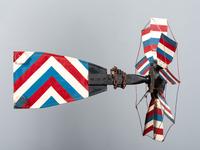 A Patriotic Red, White and Blue Painted Sheet Metal Whirligig