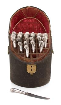 A Georgian Silver Knife Set in a Fitted Brass Mounted Case, , comprising twelve dinner knifes and twelve luncheon knives, having steel