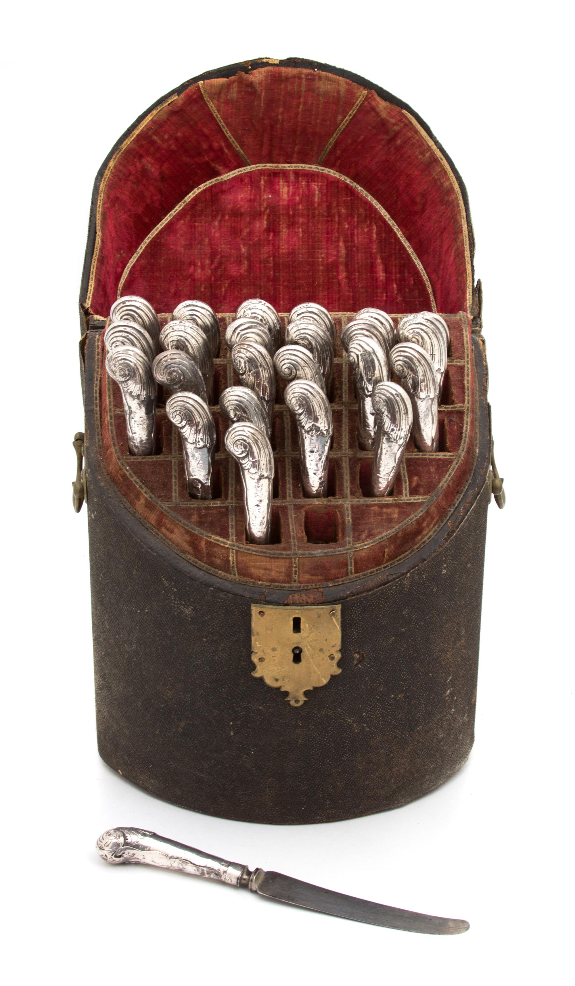 A Georgian Silver Knife Set in a Fitted Brass Mounted Case, , comprising twelve dinner knifes and twelve luncheon knives, having steel