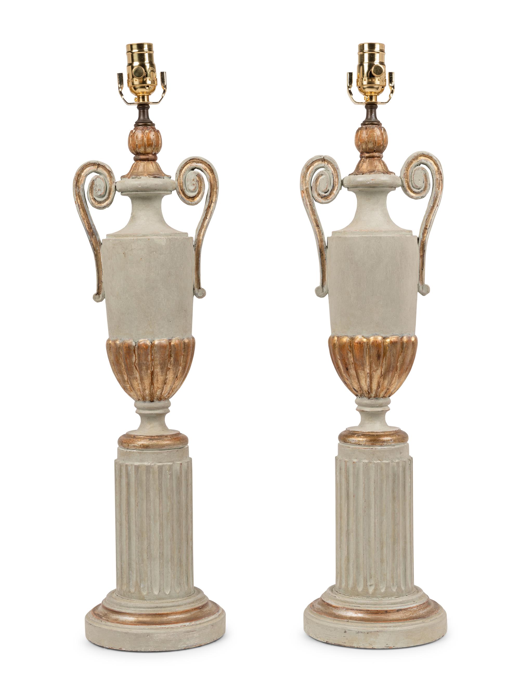 A Pair of Painted and Parcel Gilt Urns on Plinths Mounted as Lamps