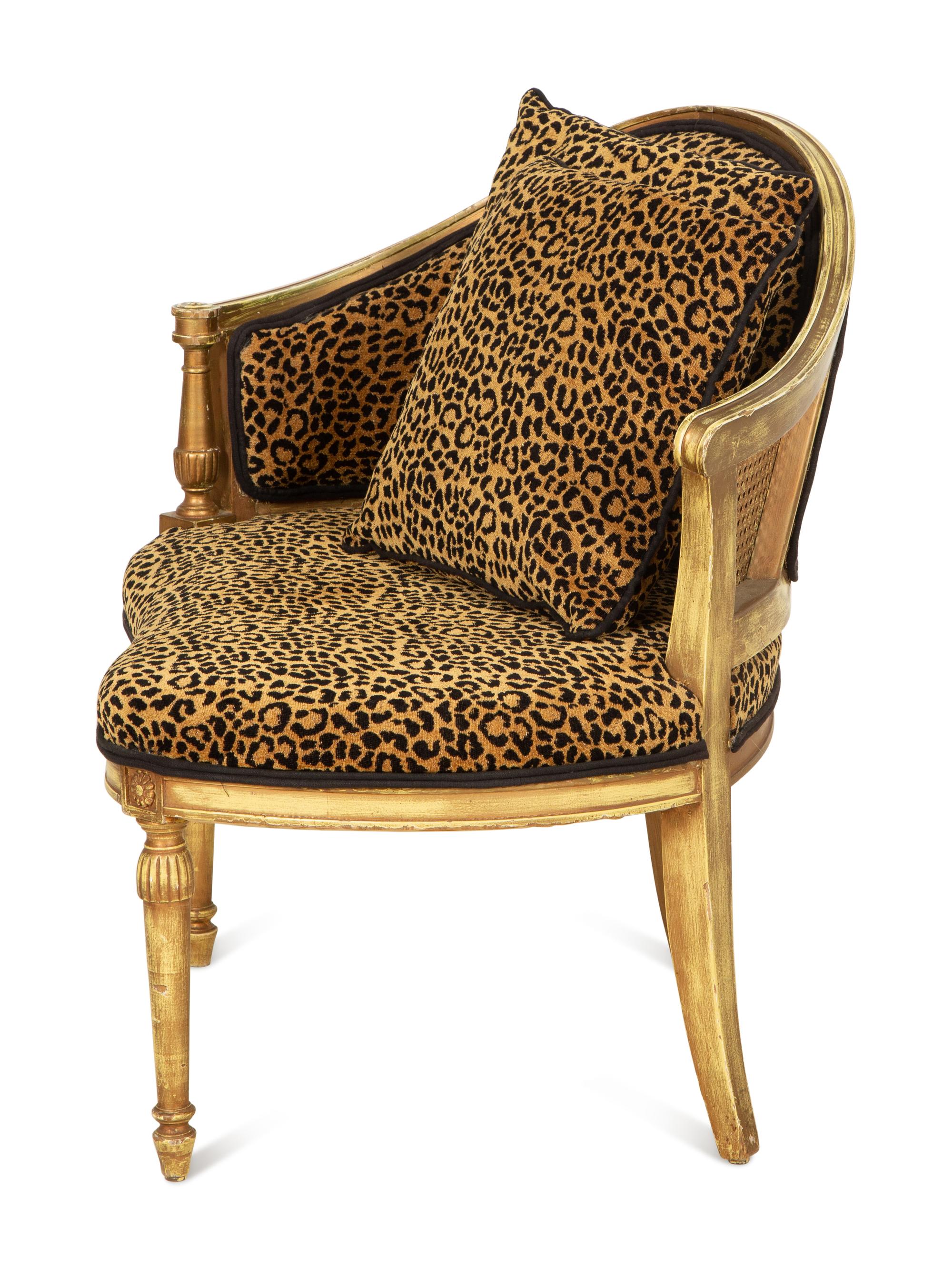 A Louis XVI Style Giltwood Caned Chair