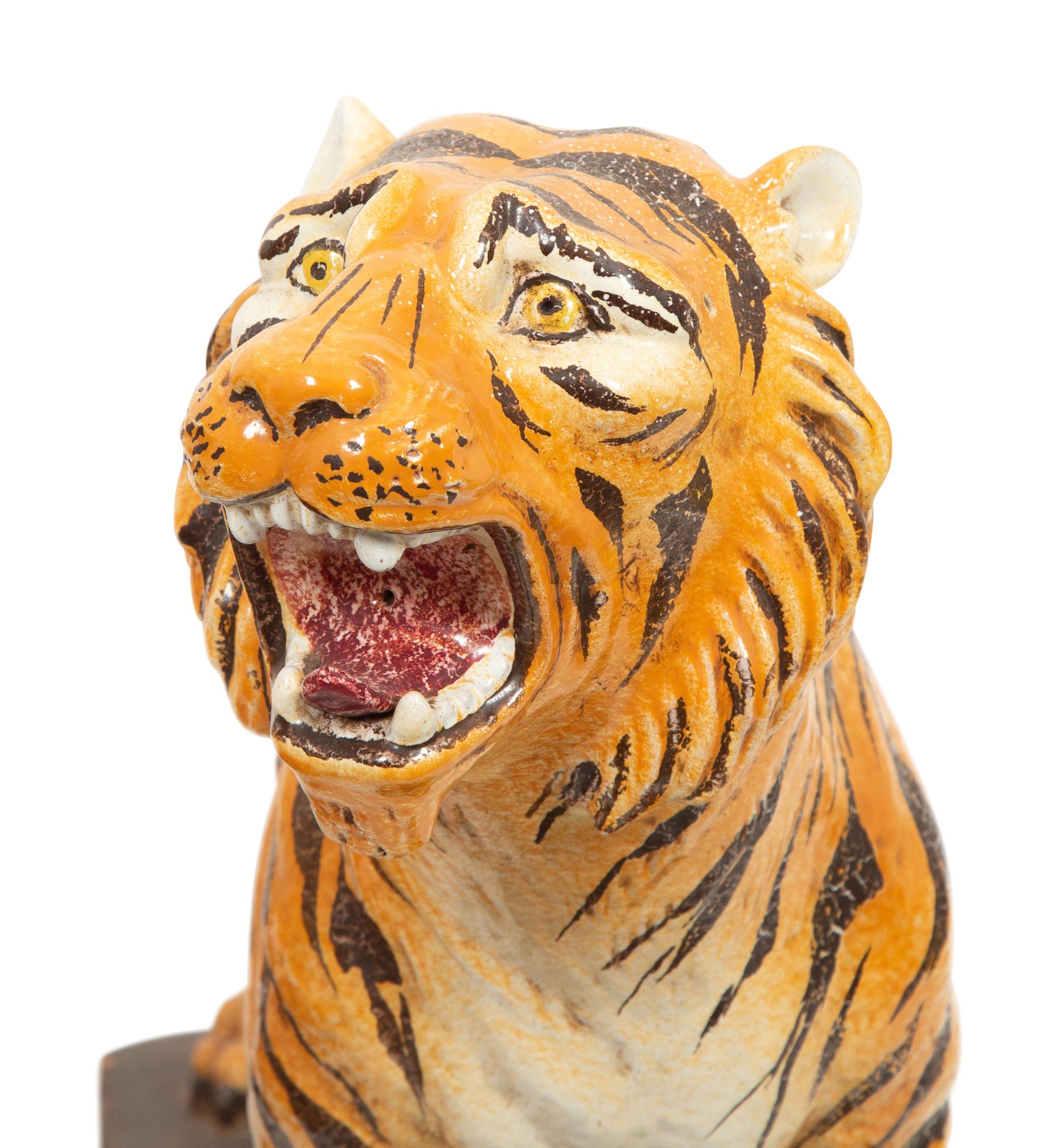 A Pair of Italian Glazed Terracotta Figures of Standing Tigers