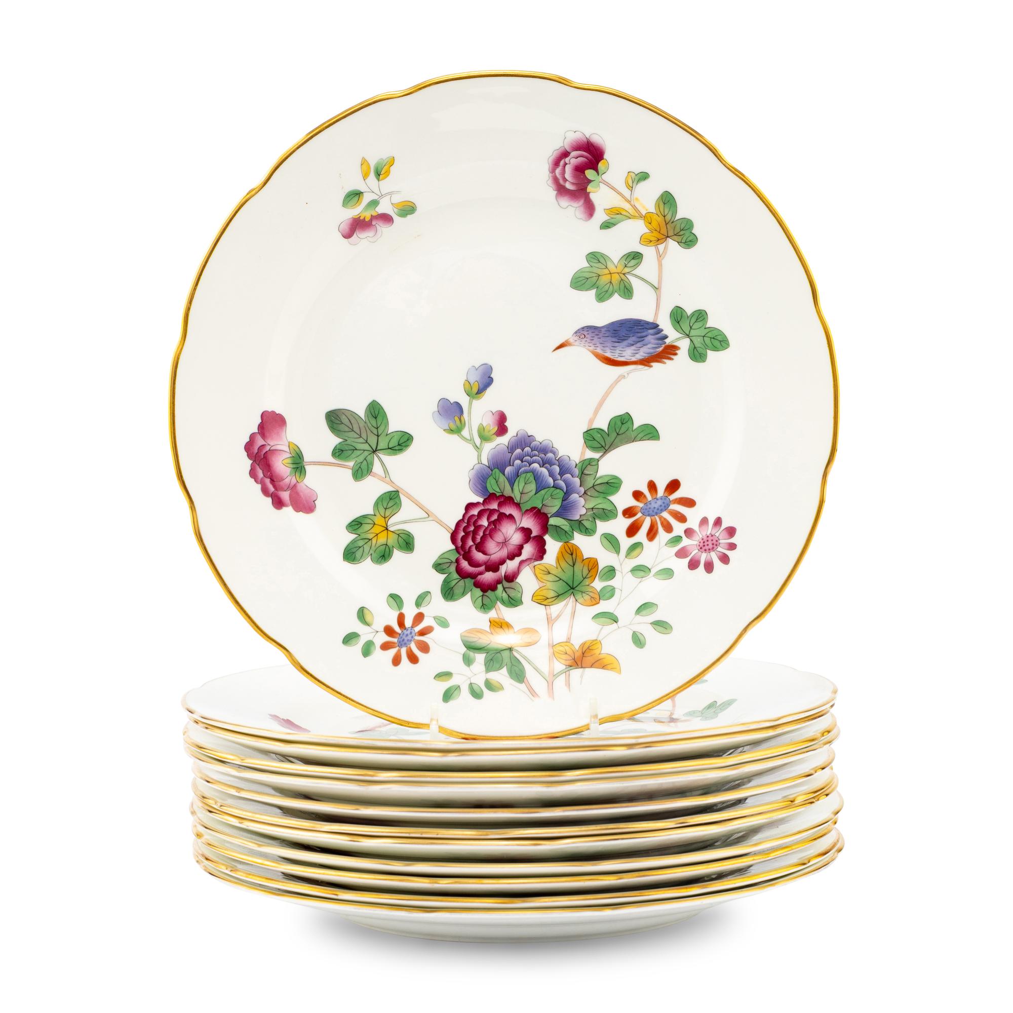 A Set of Twelve Wedgwood Cuckoo Porcelain Dinner Plates