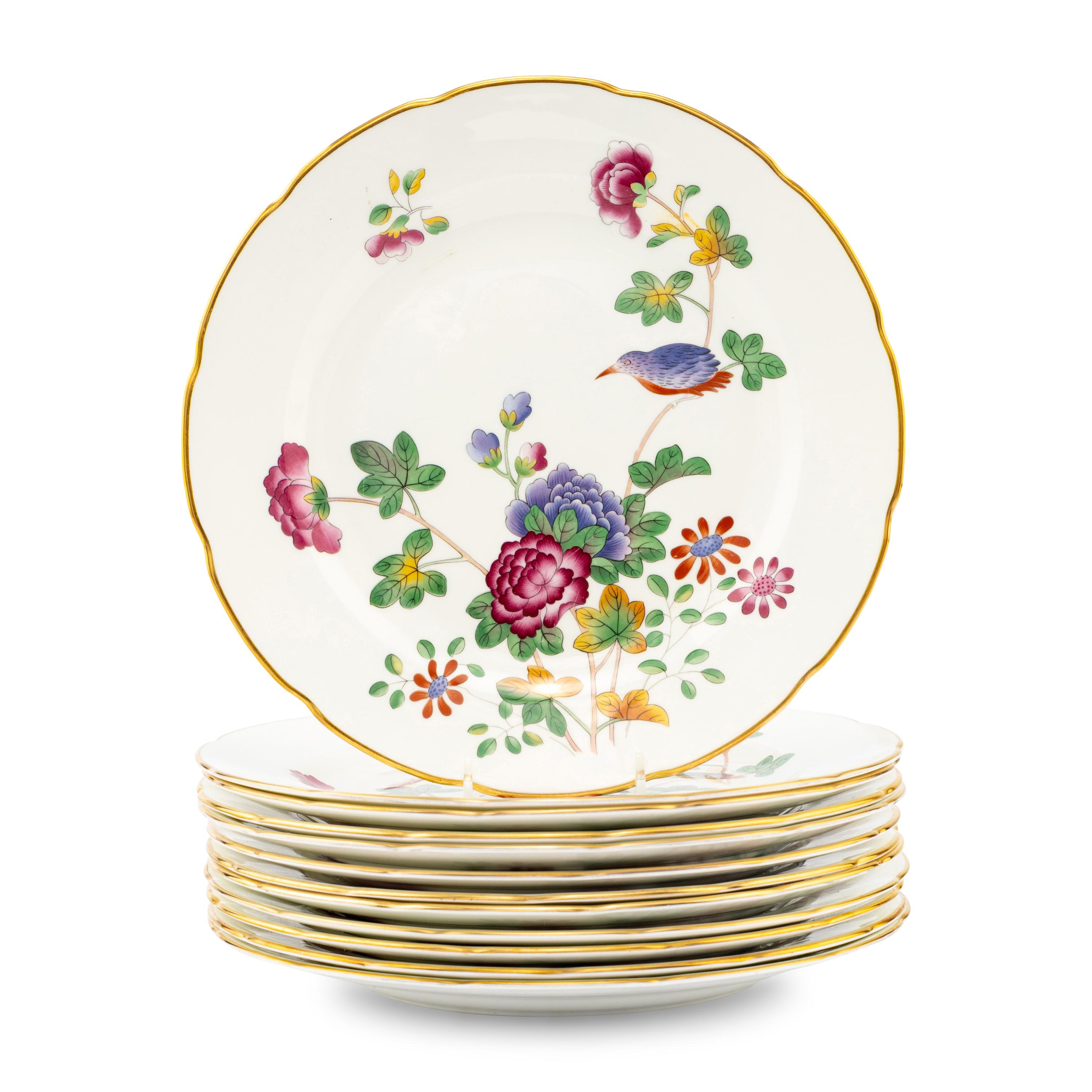 A Set of Twelve Wedgwood Cuckoo Porcelain Dinner Plates