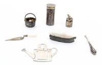 Three English Silver Articles, 20TH CENTURY, comprising a shotgun shell coin holder, James Purdey & Sons, a small jar with mouse form f