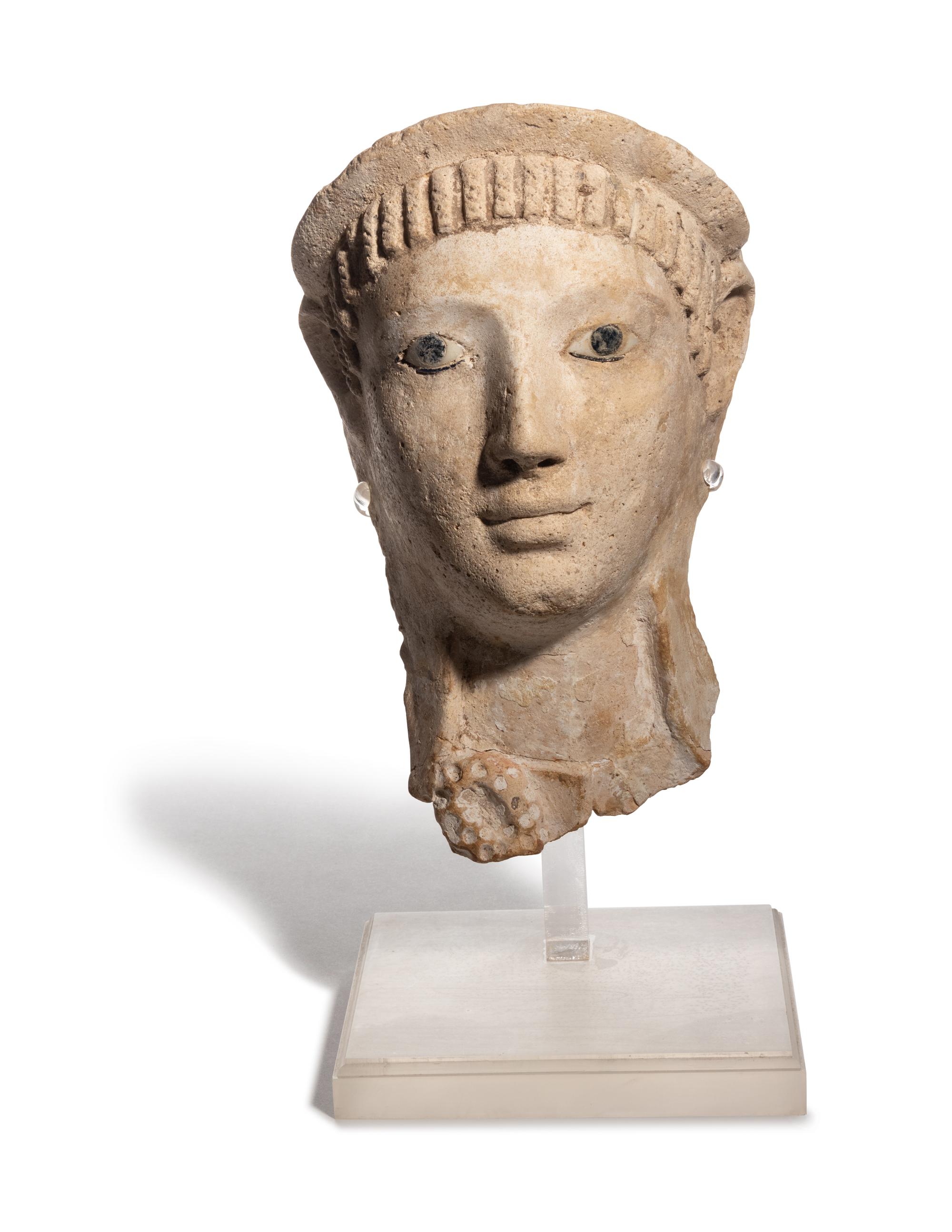 A Romano-Egyptian Stucco Mummy Mask with Glass Eyes