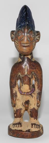 A Yoruba Wood Ibeiji Finial. Height 12 inches.