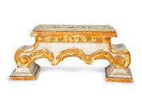 A Pair of Continental Painted and Parcel Gilt Candelabra
