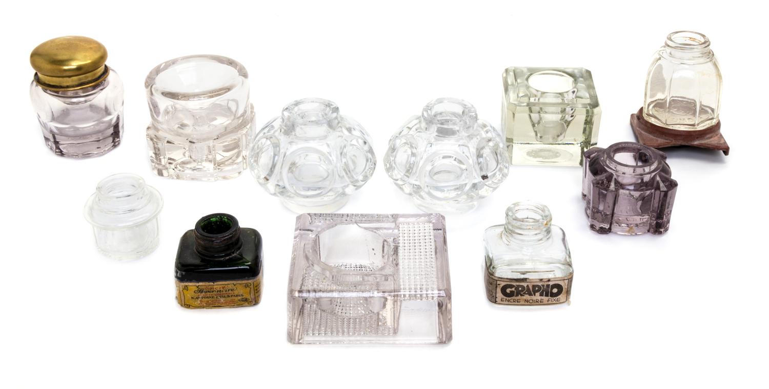 An Assembled Group of Eleven Glass Inkwells and Ink Bottles Height of tallest 2 3/4 inches.