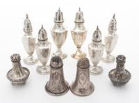 A Collection of American Silver Casters Height of tallest pair 5 1/4 inches. — 20th Century