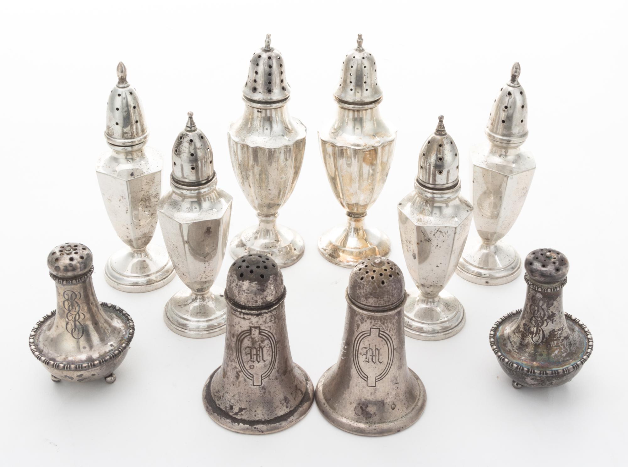 A Collection of American Silver Casters Height of tallest pair 5 1/4 inches. — 20th Century