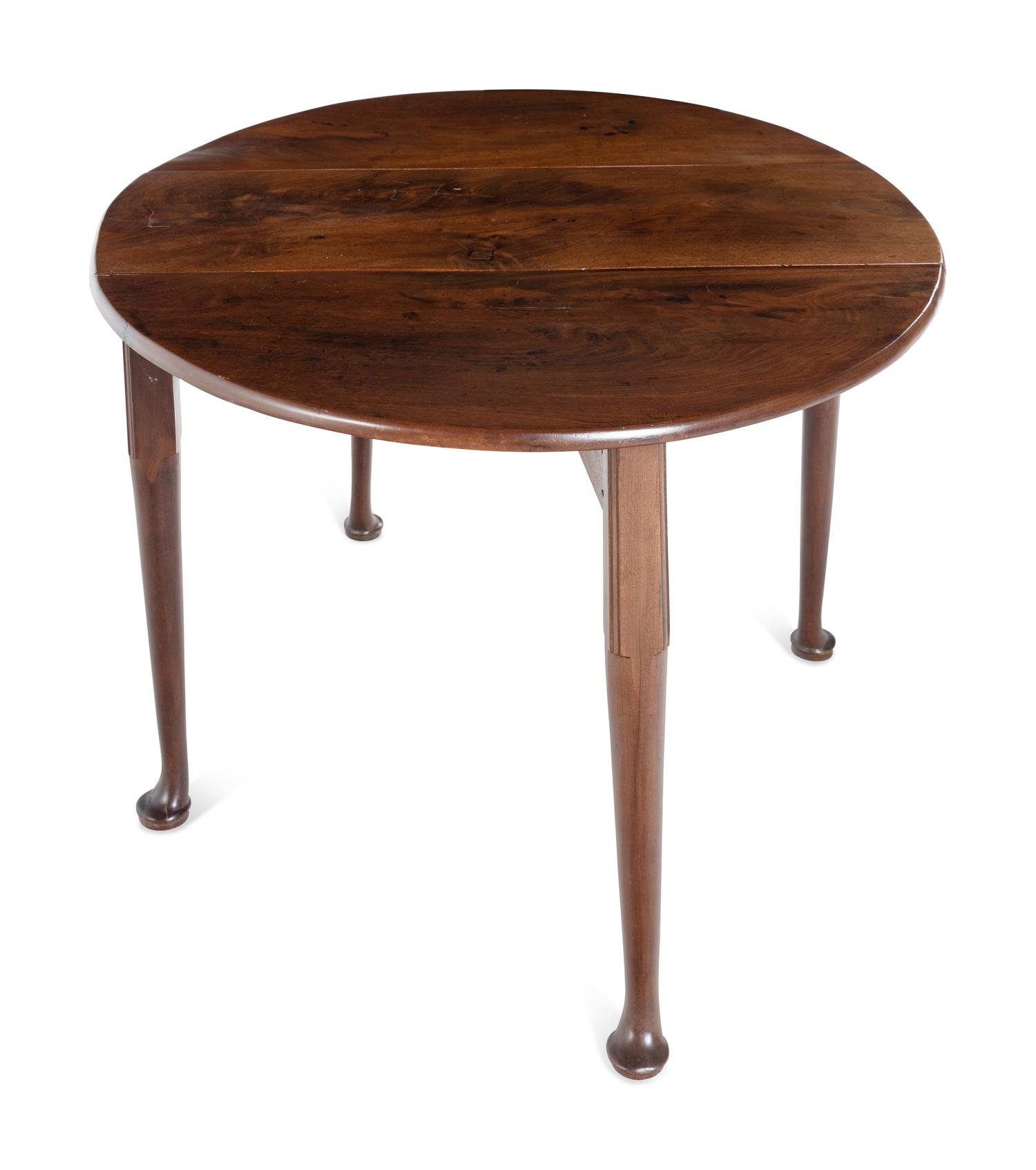A George III Mahogany Drop-Leaf Gate-Leg Table