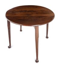 A George III Mahogany Drop-Leaf Gate-Leg Table