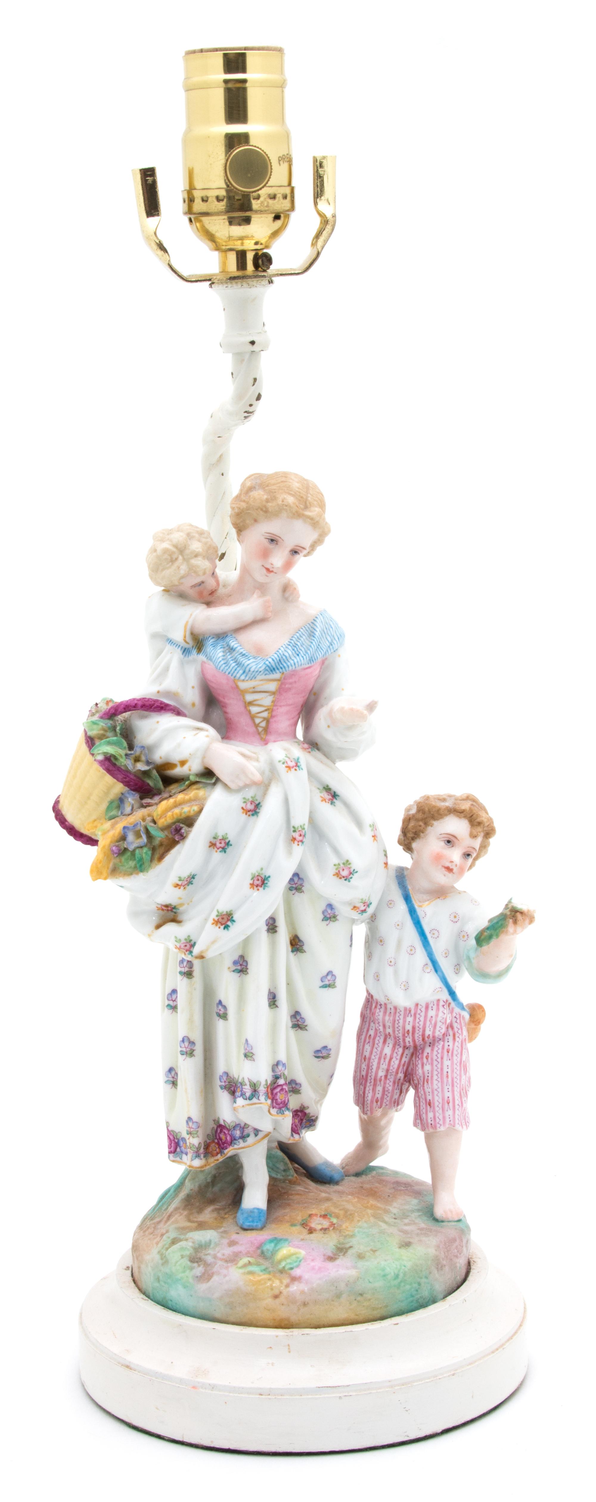 A German Painted Porcelain Figural Group Height 10 inches. — 20TH CENTURY