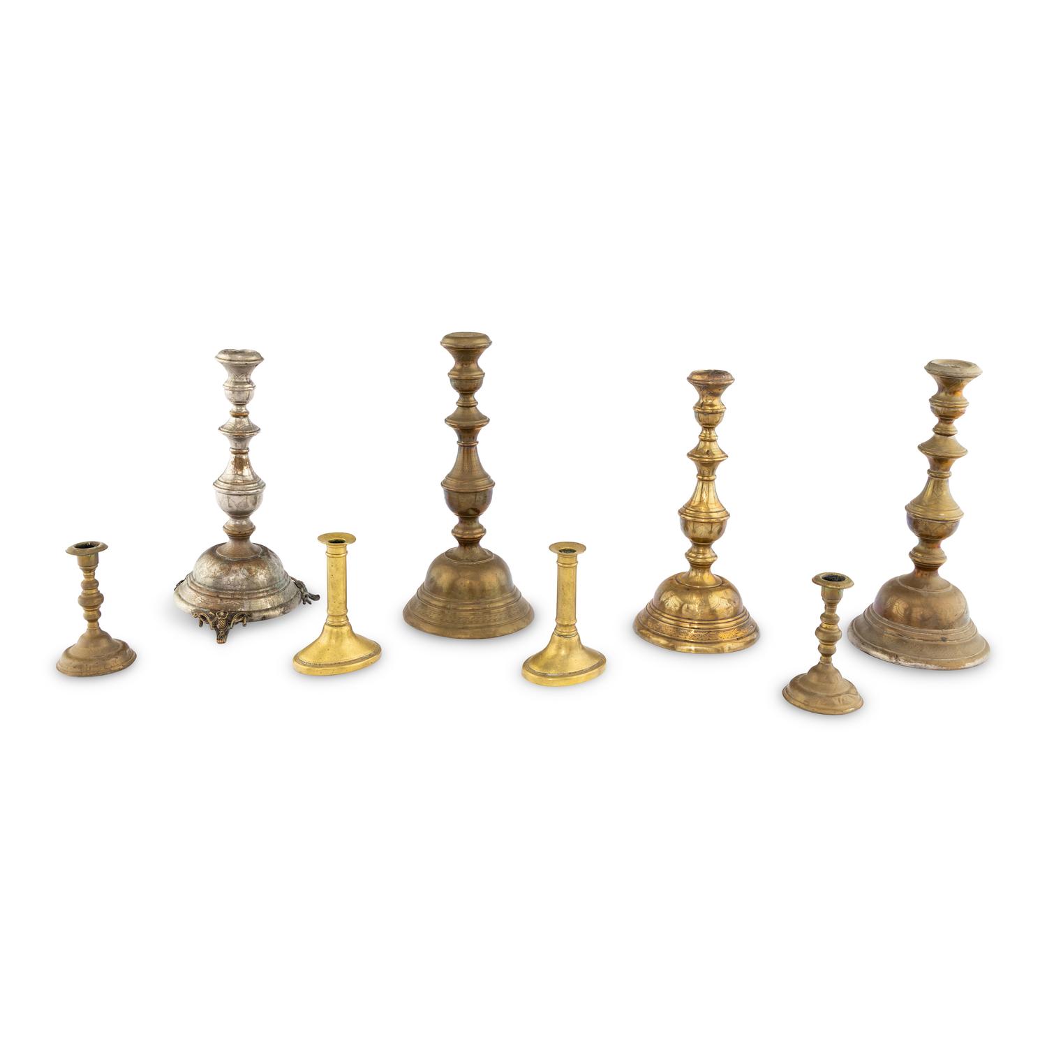A Collection of Eight Candlesticks