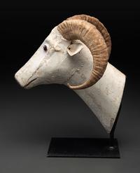 A Folk Art Carved and Painted Wood Ram's Head