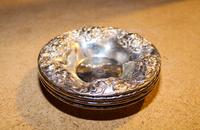 A Set of Four American Silver Nut Dishes, S. Kirk & Son, Baltimore, MD, Repousse pattern, centered by an engraved monogram.