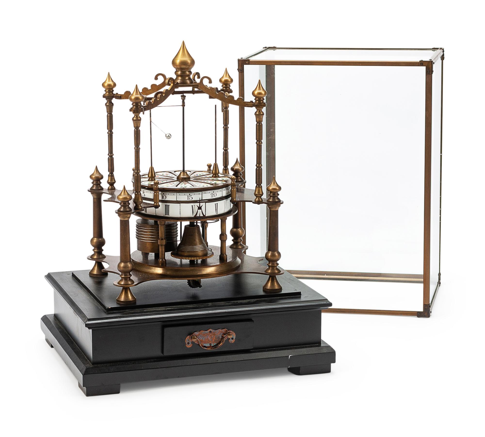 An Orbital Bronze and Enameled Mantel Clock with a Glass Dome