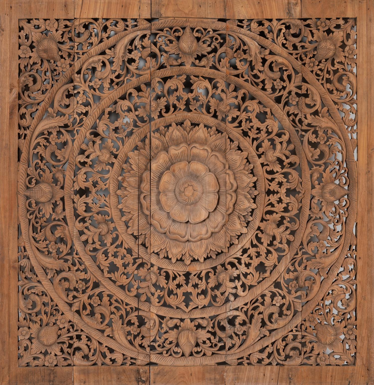 A Southeast Asian Carved Teakwood Mandala Panel
