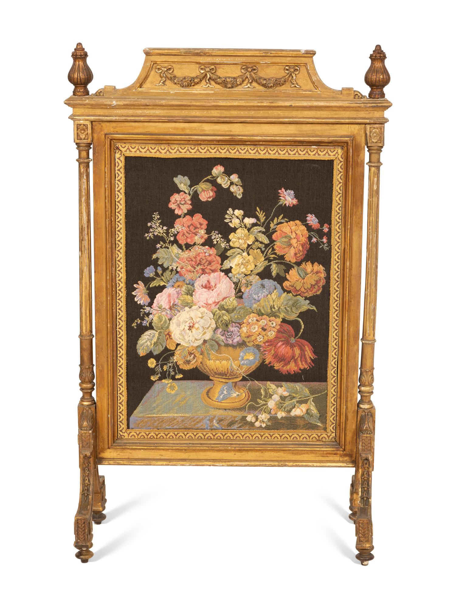 A Louis XVI Style Giltwood Fire Screen with Needlework Panel