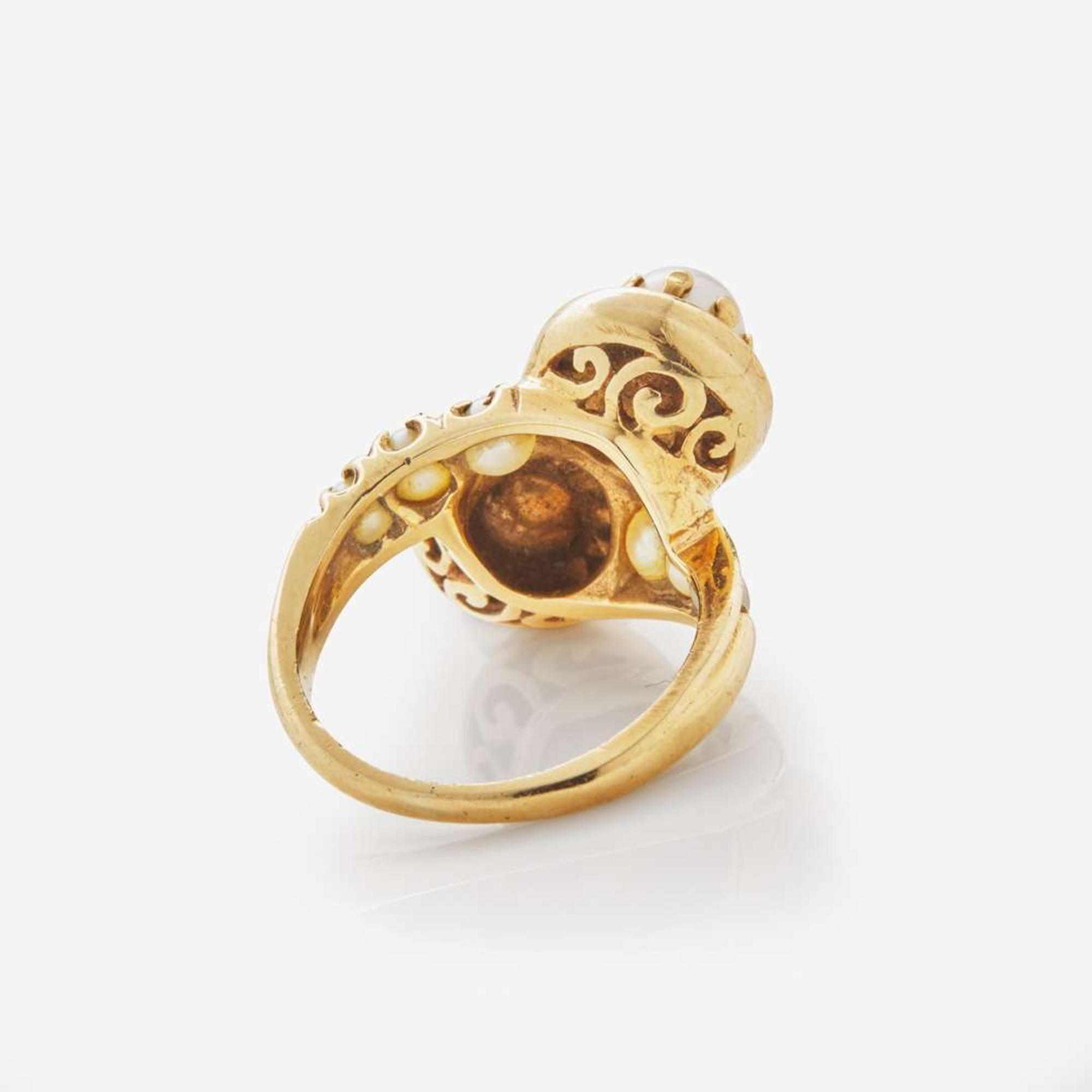 A 14K Yellow Gold, Garnet, and Pearl Ring Victorian