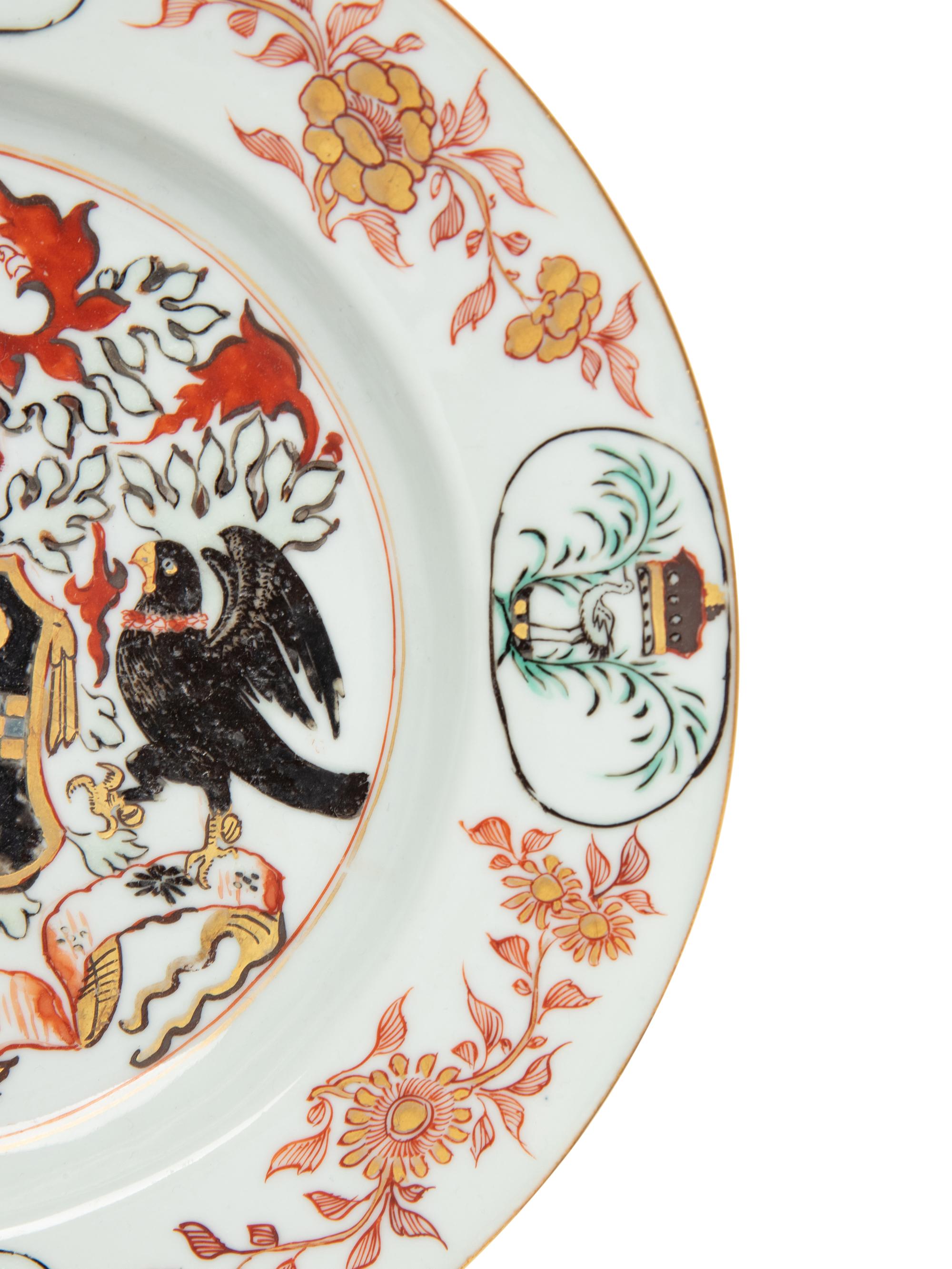 A Chinese Export Porcelain Parcel-Gilt Armorial Plate